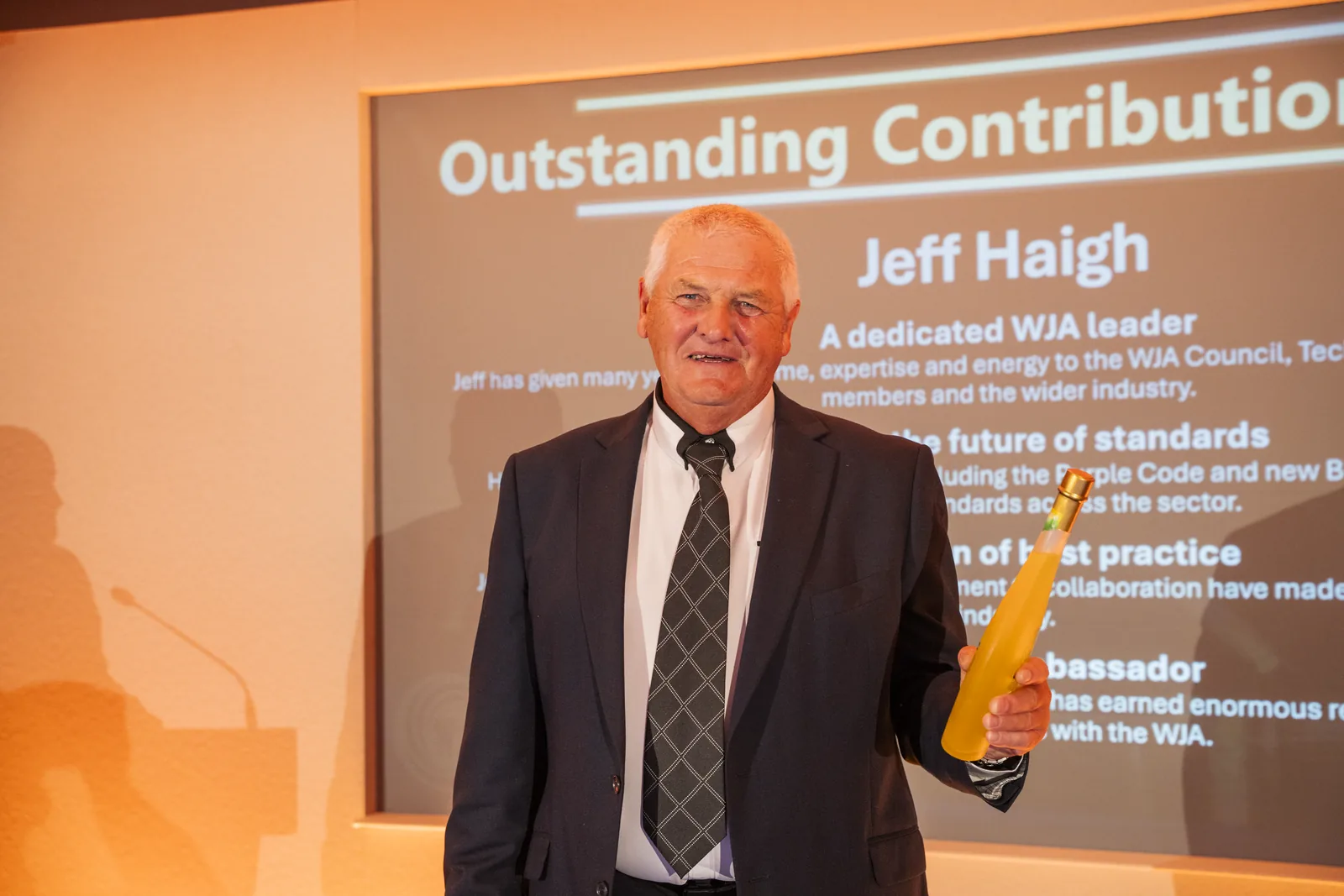 Jeff Haigh receiving the Outstanding Contribution award