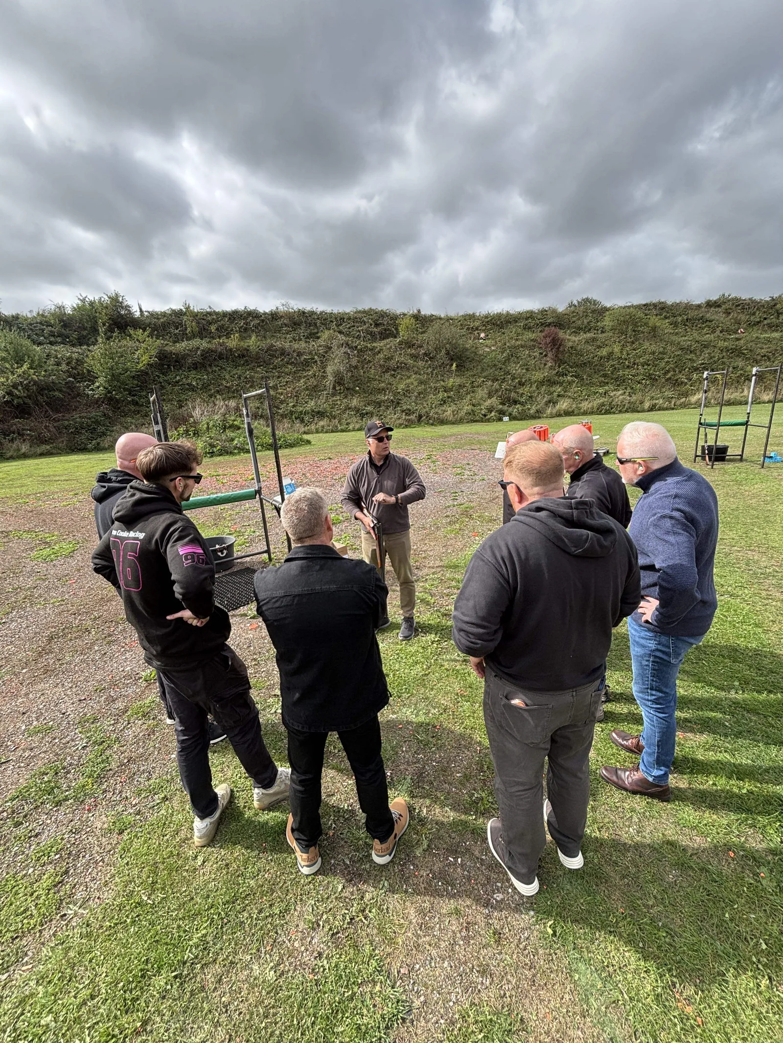 The clay shooting group receiving their briefing